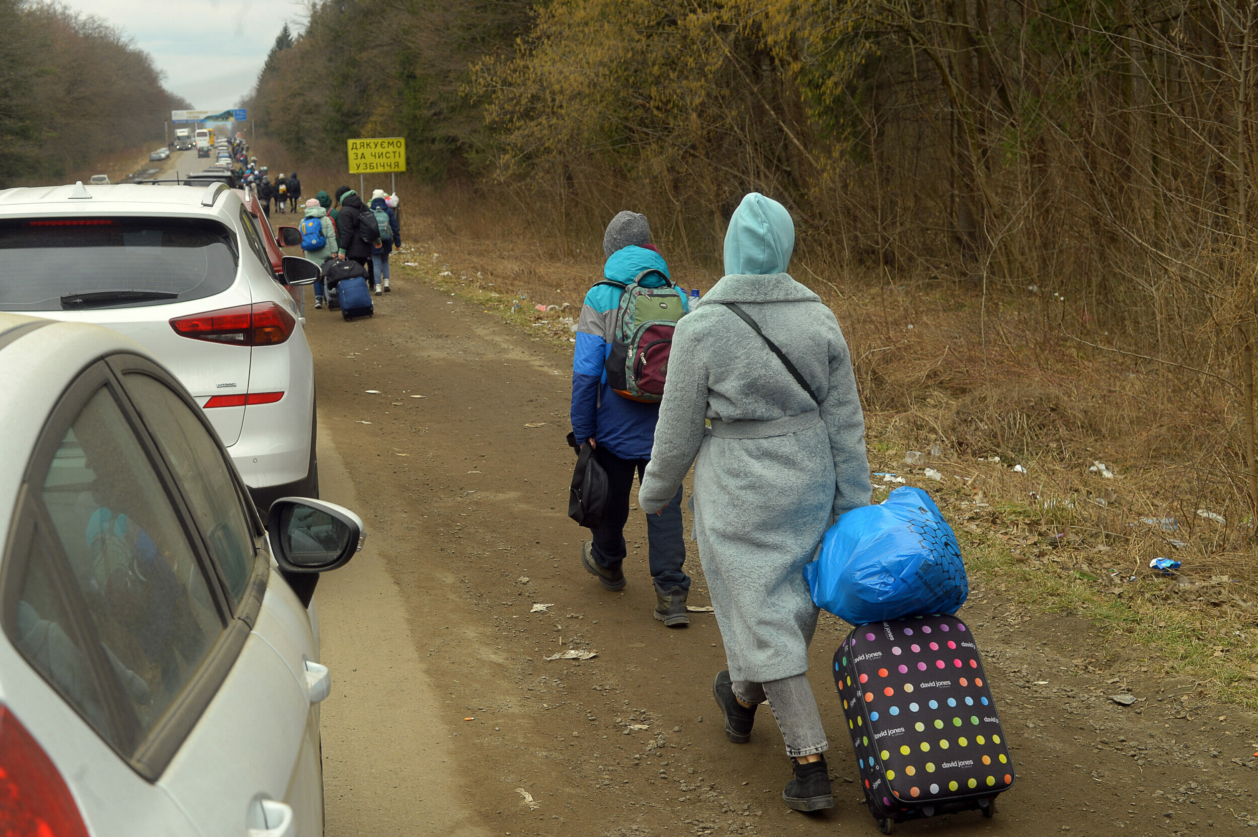 Millions of people have now fled the war in Ukraine. At the beginning of March, people made their way through Shehyni, Ukraine, towards Poland.