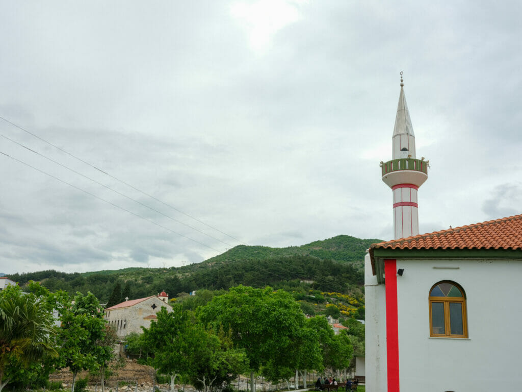 Orthodox churches and mosques stand nearby in the villages in the Greek region of Xanthi.